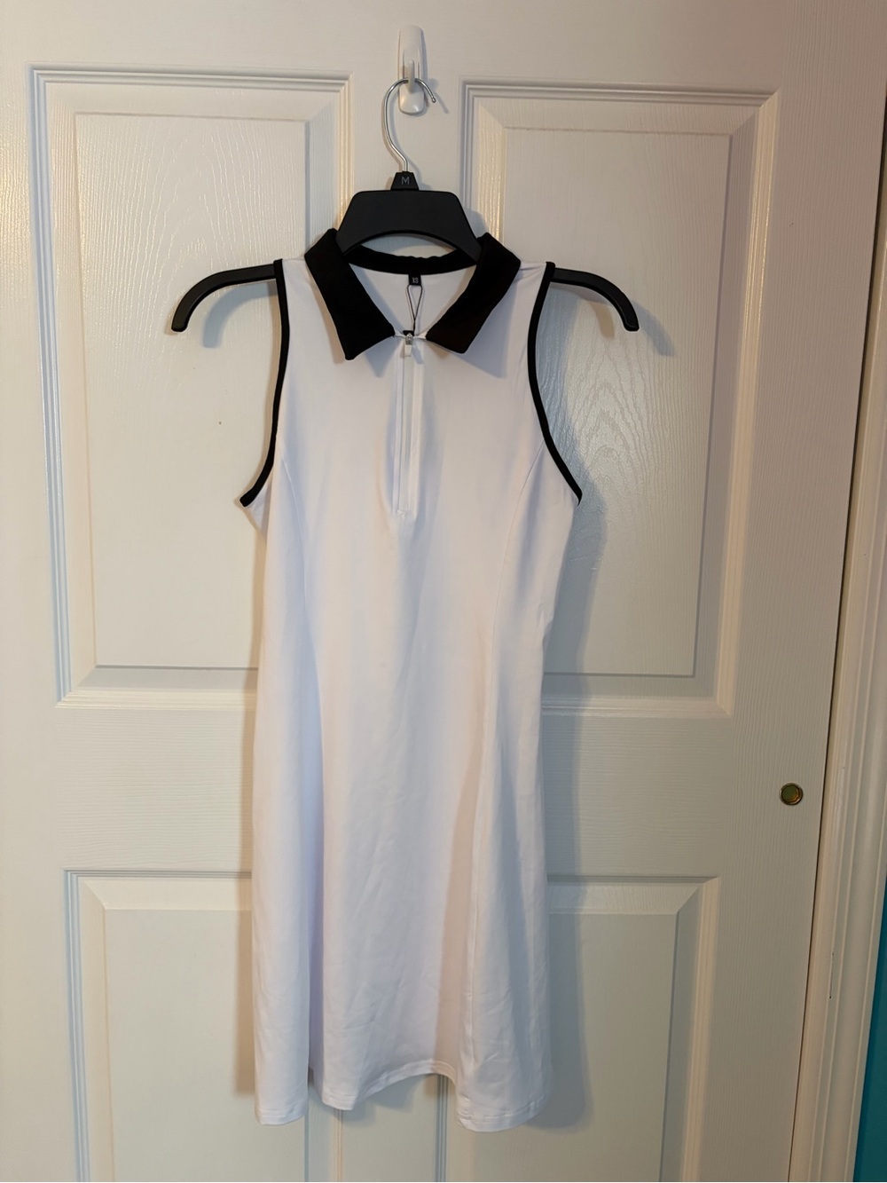 Sleeveless White Polo Dress with Black Trim